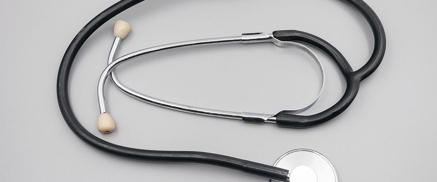 A stethoscope on a plain background